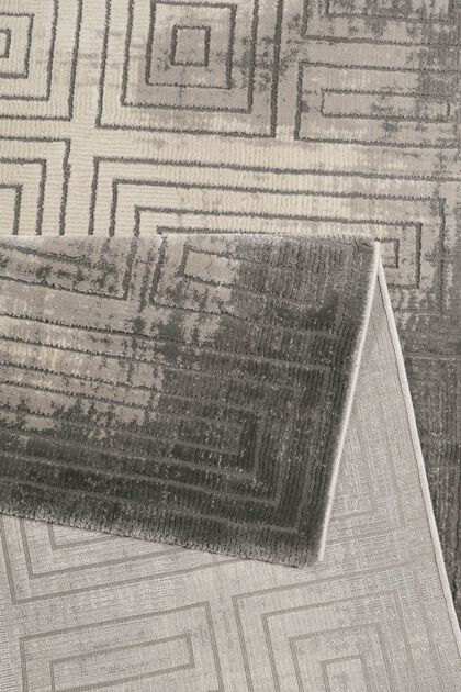 Web-Teppich mit geometrischem Muster